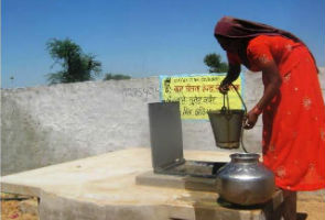Women using Community Rain Water Harvesting Tank at Dhar Ki Dhani